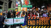 Tens of thousands rally in New York demanding end to fossil fuels