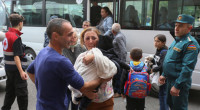 Refugees fleeing Nagorno-Karabakh arrive in Armenia